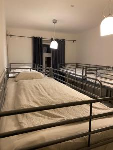 Posteľ alebo postele v izbe v ubytovaní Easy Housing