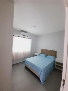 Katil atau katil-katil dalam bilik di APARTAMENTO EM PEROBA - MARAGOGI