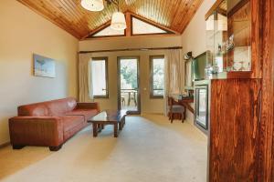 a living room with a couch and a table at Gazelle Resort & Spa in Bolu