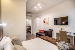 TV a/nebo společenská místnost v ubytování Hotel Sorrento City