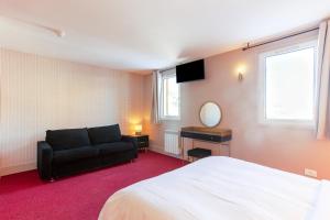 Voodi või voodid majutusasutuse HOTEL TURAN toas