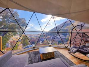 a room with a large window in a tent at Mt,Fuji Glamping Terrace Minenohana - Vacation STAY 35712v in Oishi