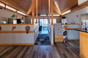 a room with a store with wooden ceilings at Quality Inn & Suites Marion in Marion