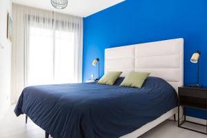 Posteľ alebo postele v izbe v ubytovaní Apartamento Málaga Halia + 24 fotografií