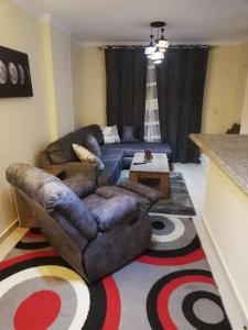 A seating area at Comfortable studio in madinaty compound B11