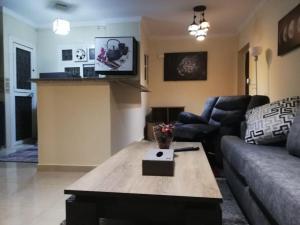 A television and/or entertainment centre at Comfortable studio in madinaty compound B11