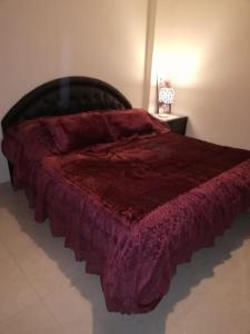 A bed or beds in a room at Comfortable studio in madinaty compound B11