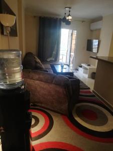 A seating area at Comfortable studio in madinaty compound B11