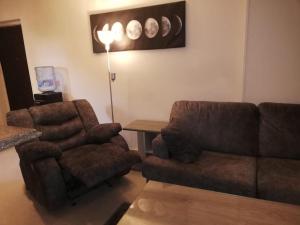 A seating area at Comfortable studio in madinaty compound B11