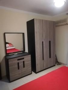 A bed or beds in a room at Comfortable studio in madinaty compound B11