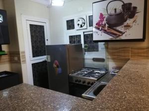 A kitchen or kitchenette at Comfortable studio in madinaty compound B11