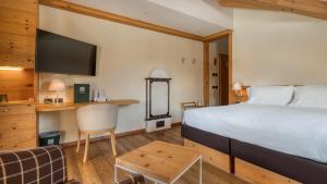 Postel nebo postele na pokoji v ubytování Maribel Hotel