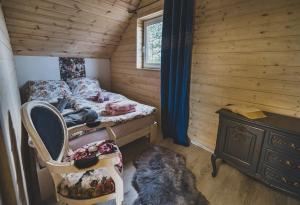 Postel nebo postele na pokoji v ubytování Kaszuby wczasy u Danusi sauna i bania