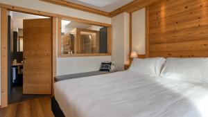 Postel nebo postele na pokoji v ubytování Maribel Hotel