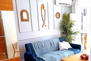 A seating area at Apartament z basenem, przy plaży