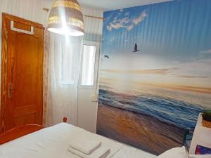 A bed or beds in a room at Apartament z basenem, przy plaży