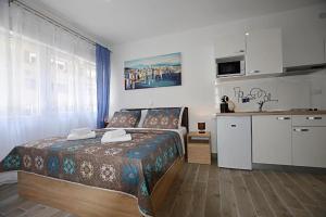 Posteľ alebo postele v izbe v ubytovaní Roko & Borna Zadar