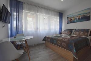 Posteľ alebo postele v izbe v ubytovaní Roko & Borna Zadar