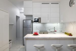 Virtuvė arba virtuvėlė apgyvendinimo įstaigoje Charming apartment in calm and central area