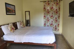 Letto o letti in una camera di Sneh Deep Guest House