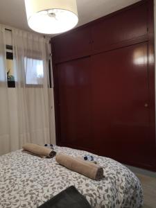 Posteľ alebo postele v izbe v ubytovaní Apartamento Benalmádena costa, Torremuelle