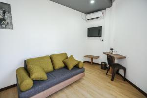 Posezení v ubytování New Dawn Hotel Pontian Sdn Bhd