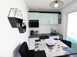 TV a/nebo společenská místnost v ubytování 972D5 - Sinobol - Appartement F3 40m2 vue ville