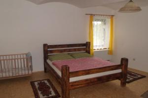 Postel nebo postele na pokoji v ubytování Bezbariérové ubytování na statku