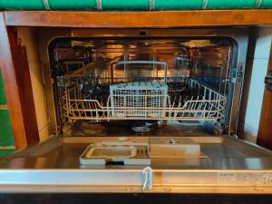 A kitchen or kitchenette at VILLA VICINUS - 120 mq - parking - garden