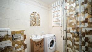 Kúpeľňa v ubytovaní Apartamenty EverySky - Saneczkowa 3 + 1 fotografia