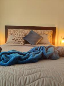 Een bed of bedden in een kamer bij cerrada de nuevo
