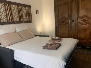 Postel nebo postele na pokoji v ubytování Mes Oasis Nancy