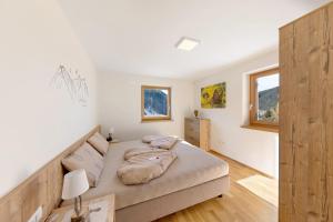 Posteľ alebo postele v izbe v ubytovaní Töniglerhof Apt Abendrot