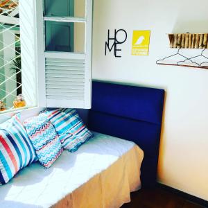 Postel nebo postele na pokoji v ubytování Casa Vintage, tranquilidade no Prado