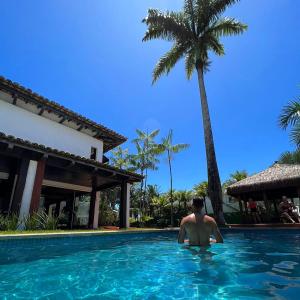 Bazén v ubytování Hotel Casa Paradiso Guarujá nebo v jeho okolí