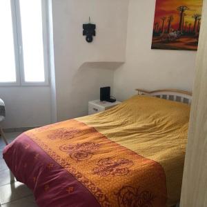 Postel nebo postele na pokoji v ubytování Coquette maison de village dans village typique,