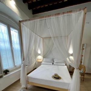 A bed or beds in a room at Apartamentos turísticos CASA de los BALCONES