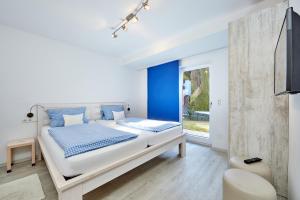 Katil atau katil-katil dalam bilik di Ferienwohnung Alpspitze