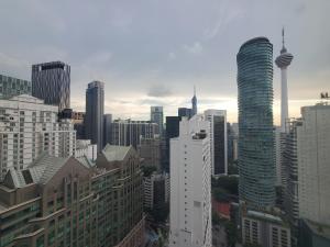 Nespecifikovaný výhled na destinaci Kuala Lumpur nebo výhled na město při pohledu z apartmánu