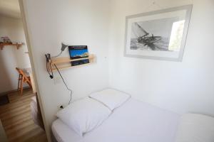 Posteľ alebo postele v izbe v ubytovaní Studio 24m2, 1 chambre pied des pistes