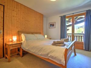 Posteľ alebo postele v izbe v ubytovaní Bel Appartement Spacieux à Morzine - 8 Personnes, 90m², Accès Direct aux Pistes et Téléphérique - FR-1-524-109