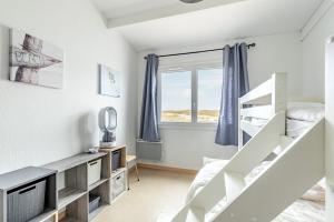 Posteľ alebo postele v izbe v ubytovaní À 50m de la plage, charmante maison à St Hilaire