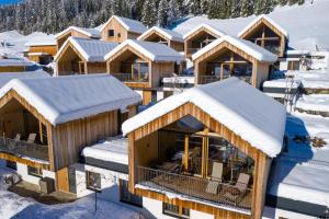 Regitnig - 4 Sterne Hotel und Chalets durante l'inverno