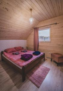 Postel nebo postele na pokoji v ubytování Kaszuby wczasy u Danusi sauna i bania + 37 fotografií