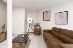 Posedenie v ubytovaní Appartement Spa - Jacuzzi privatif - Fer Rêver 63