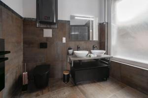 Kúpeľňa v ubytovaní Appartement Spa - Jacuzzi privatif - Fer Rêver 63