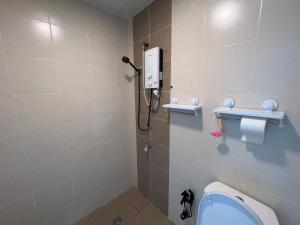 Koupelna v ubytování ITCC Manhattan Suites by PRIME