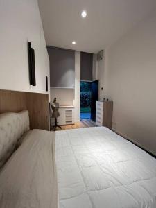 מיטה או מיטות בחדר ב-milano loft