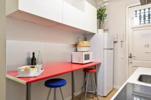 Kuchyň nebo kuchyňský kout v ubytování Sagrada Familia III by Enjoy Apartments