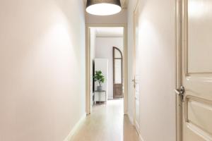 Postel nebo postele na pokoji v ubytování Sagrada Familia III by Enjoy Apartments